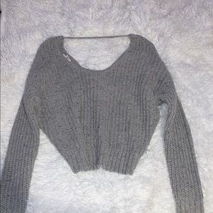 gray crossed back sweater